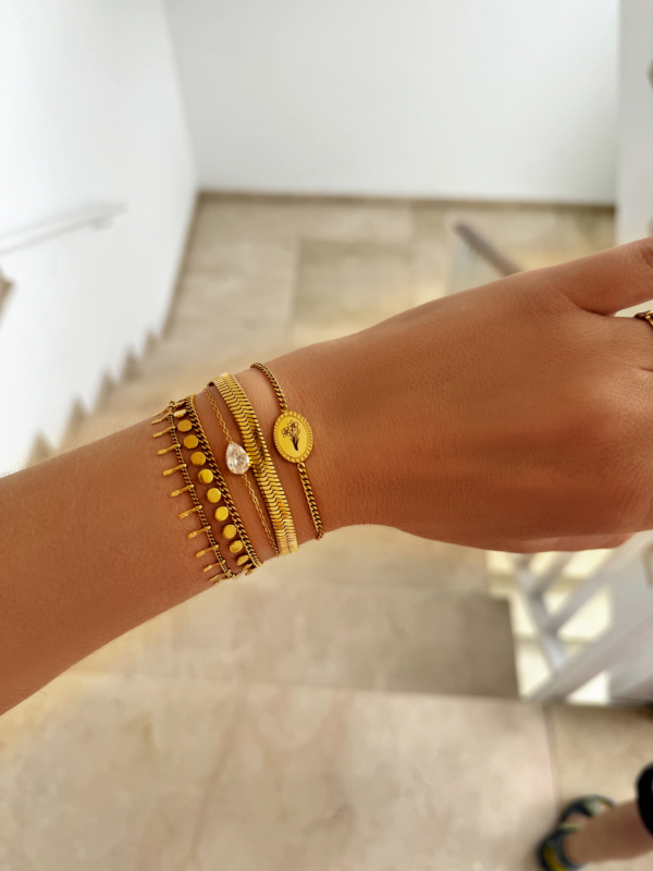 Gouden armparty met birth flower