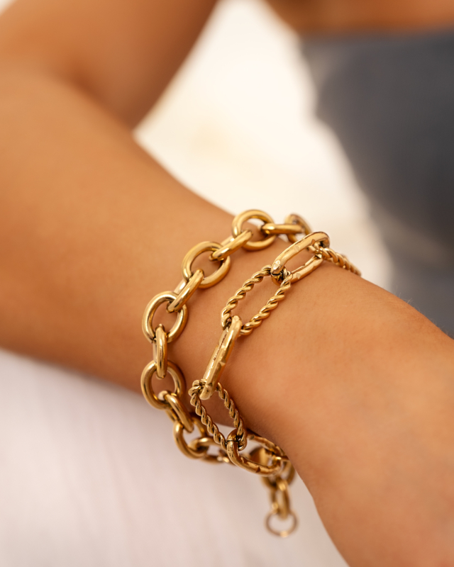 Armparty met schakels in het goud