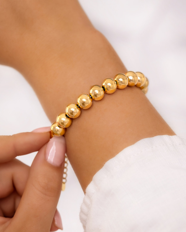 Gouden armband met bolletjes