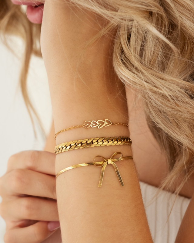 Gouden armparty met strikjes armbandje