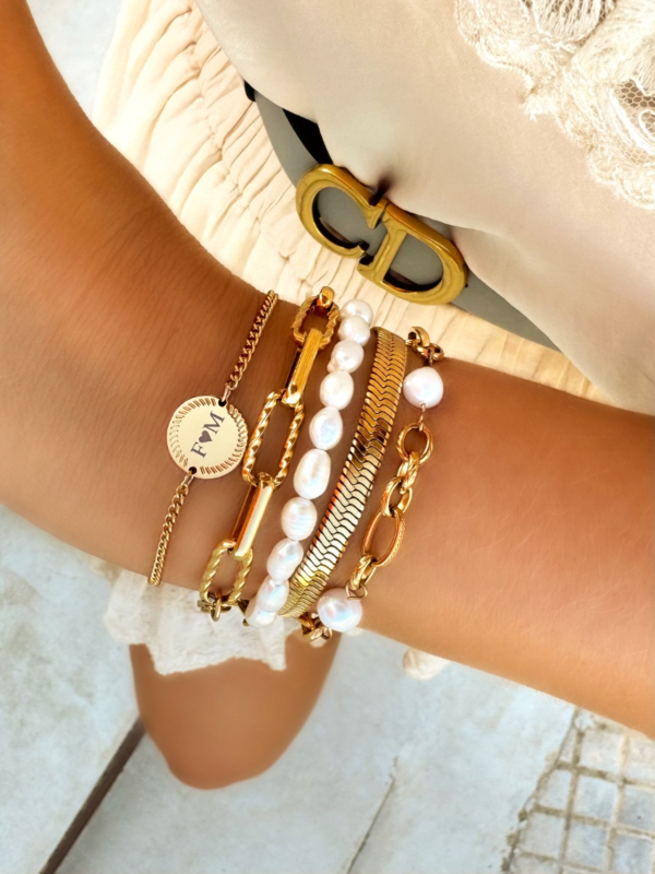 Gouden armbanden mix met parels