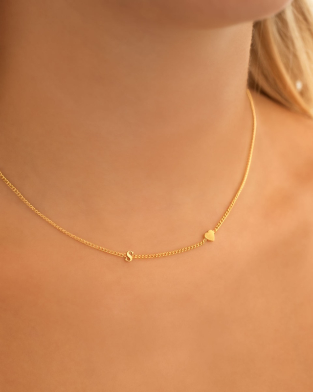 Gouden hartjes ketting met letter