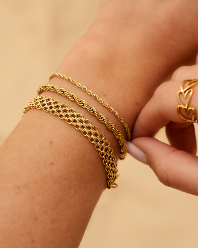 Gouden armbanden mix