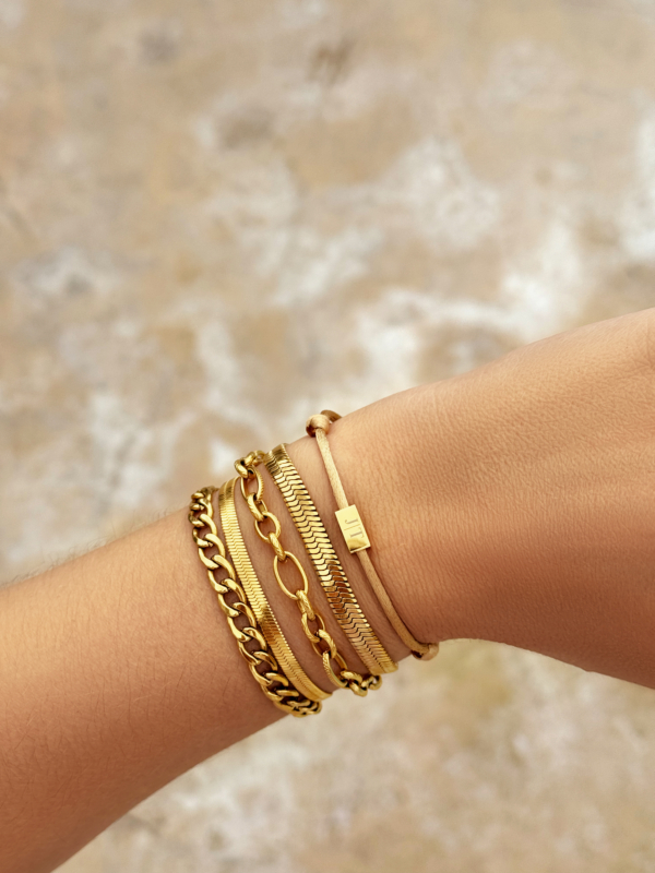 Gouden armparty met chain armbanden