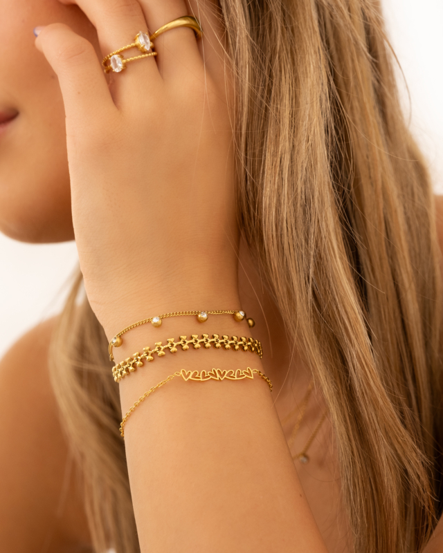 Gouden armparty met hartjes