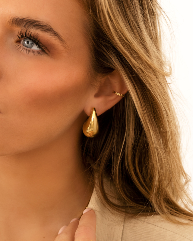 Gouden earparty met teardrop oorbel