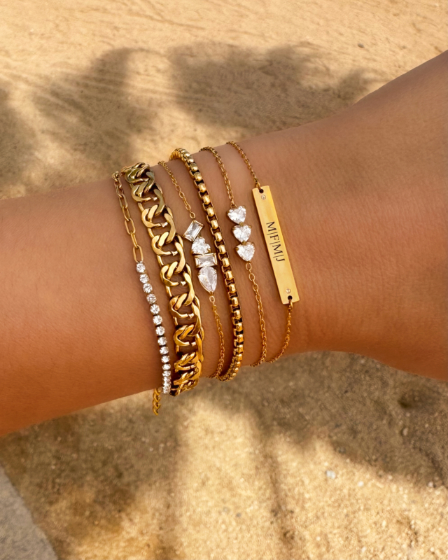 Gouden armbanden mix zomers