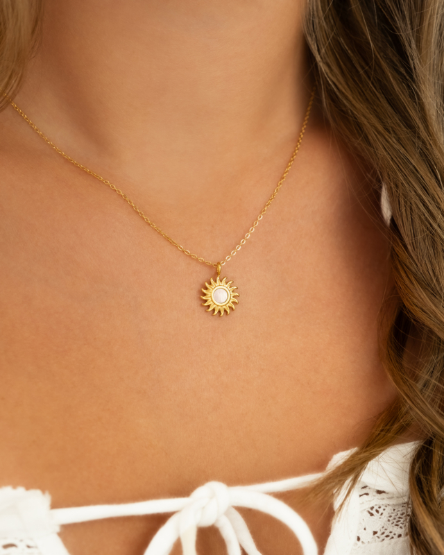 Gouden zon ketting met sea shell