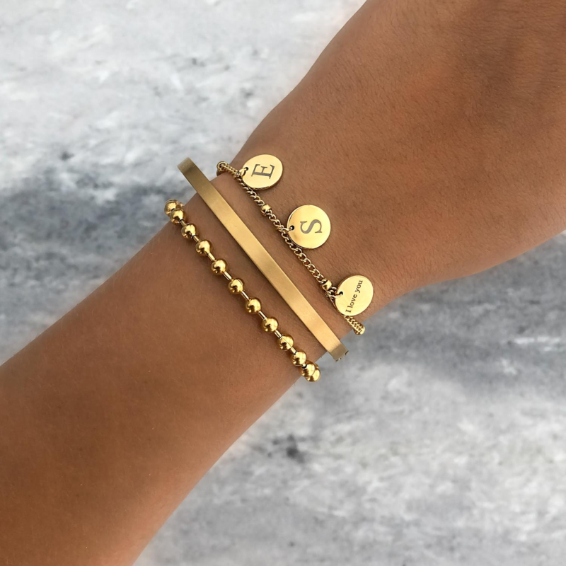 Mix van gouden armbanden