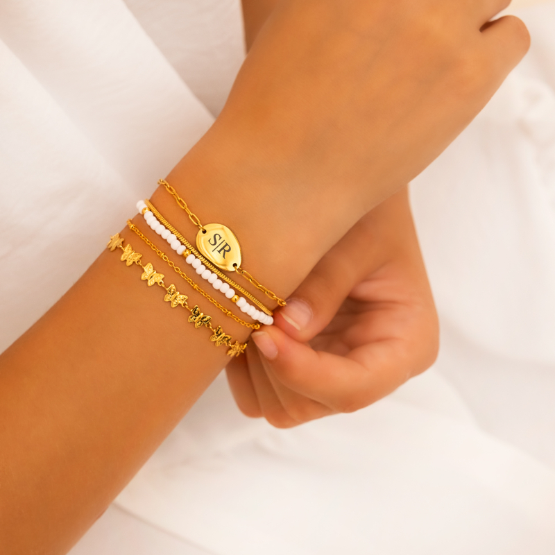 Mix van gouden armbanden