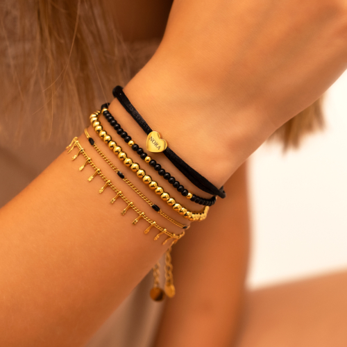 Armband Met Zwarte Bolletjes Goudkleurig