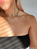 Influencer draagt choker ketting finaste