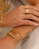 Gouden armparty met chains