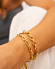 Gouden armparty met chains