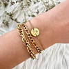 Gouden schakelarmbanden armparty combinatie