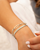 Zilveren armparty met chains