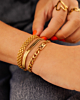 Gouden armbanden combinatie