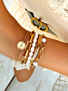 Gouden armbanden mix met parels