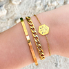 Mooie gouden details om de pols voor een complete armparty