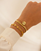 Armbanden mix in het goud