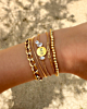 Zomerse armparty in het goud