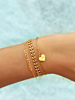 Gouden armparty met hartjes