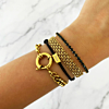 mix van trendy armbanden om arm