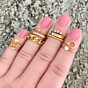 Trendy ringen om de hand voor een complete look