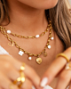 Gouden necklaceparty met witte details