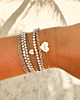 Zilveren armparty met hartjes en steentjes