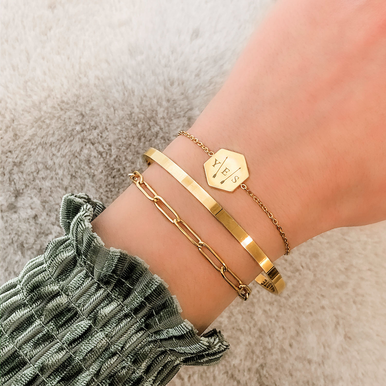 schakelarmbandjes in goud met bangle